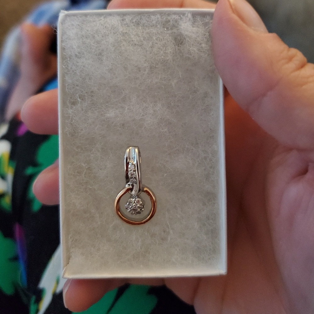 Brand new sterling silver and gold pendant